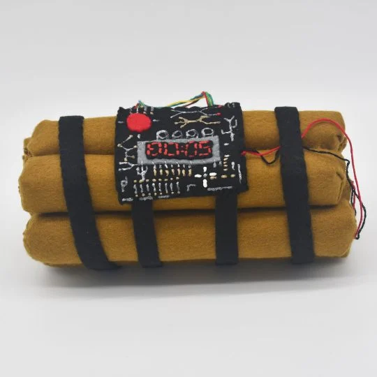 Felt dynamite by Lucy Sparrow